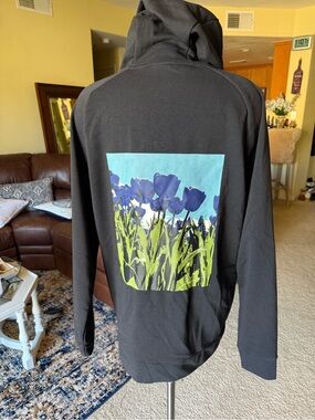 Nike Seeds Sport Performance Black Hoodie with Blue Floral Back Print